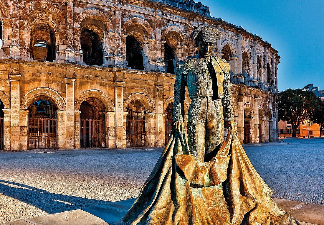France, Gard, Nimes, Arenas, quare of the Roman amphitheater Nimes with the statue of a matador Nimeño II