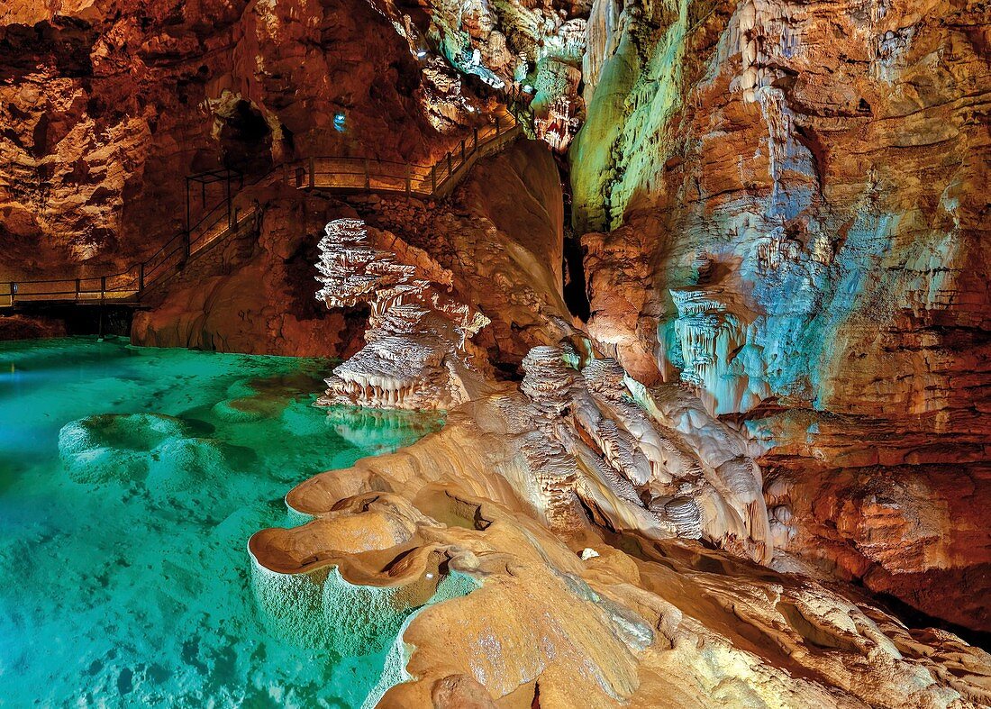 France, Midi-Pyrenees, Lot, listed at Great Tourist Sites in Midi-Pyrenees, Padirac, Padirac gulf, Natural regional park Causses du Quercy, gours lit in green at the bottom of the cave