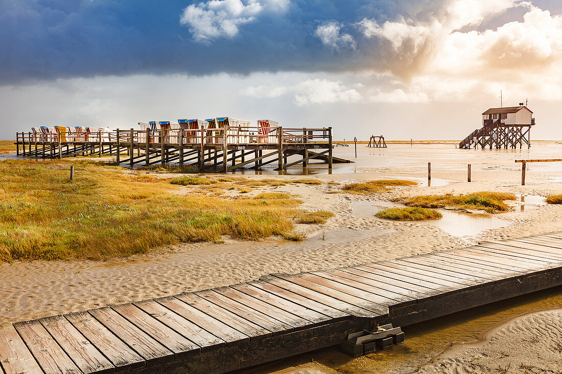 Beach chairs at Sankt Peter Ording, Eiderstedt peninsula, stormy mood, North Frisia, Schleswig-Holstein, Germany