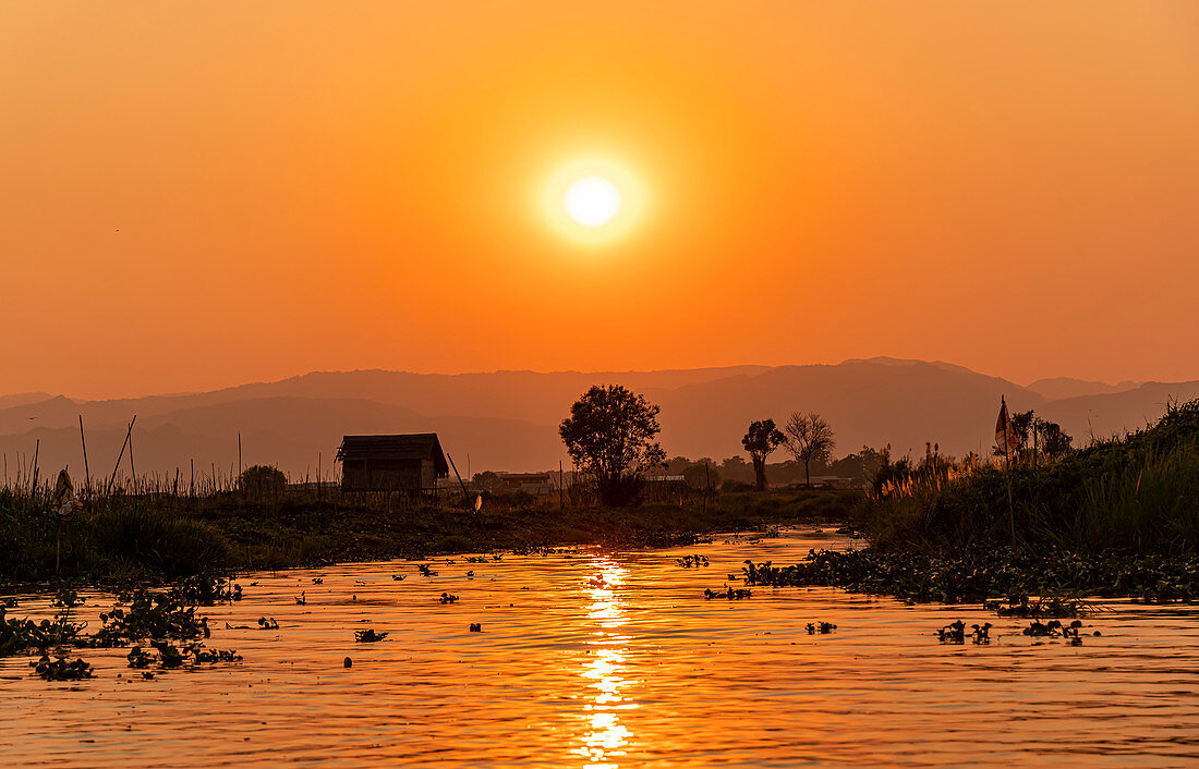 Inle Lake at sunset on boat trip, Nyaung Shwe, Myanmar