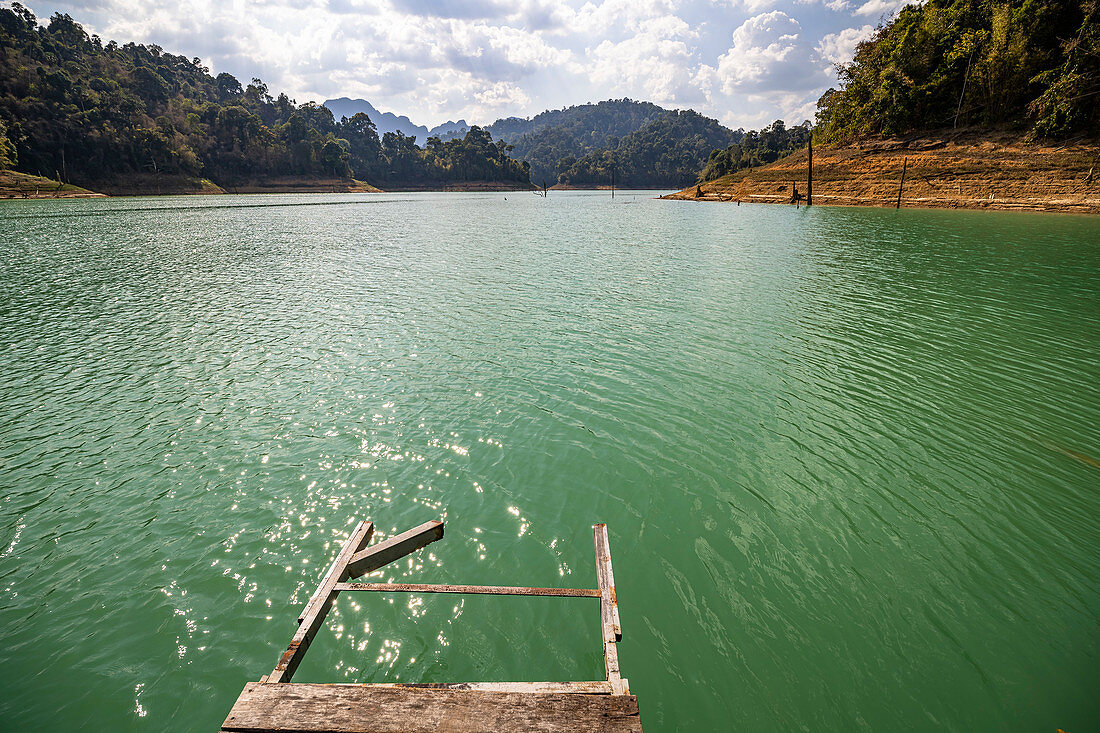 View from jetty to water of Ratchaprapha Lake in Khao Sok National Park, Khao Sok, Thailand