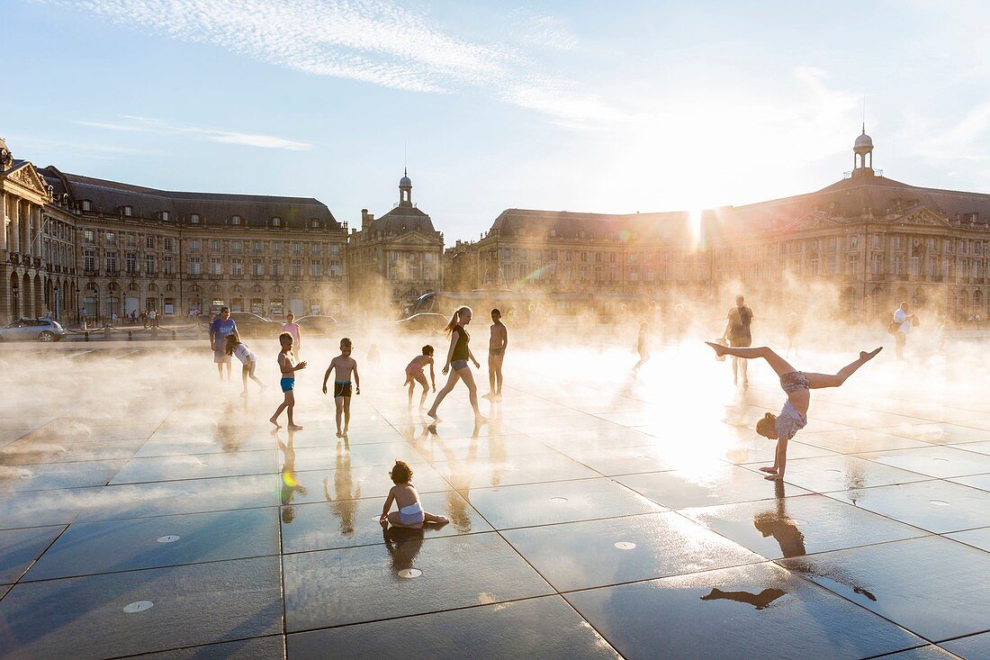 France, Gironde, Bordeaux, area listed as World Heritage by UNESCO, Saint-Pierre district, Place de la Bourse, the reflecting pool from 2006 and directed by Jean-Max Llorca fontainier
