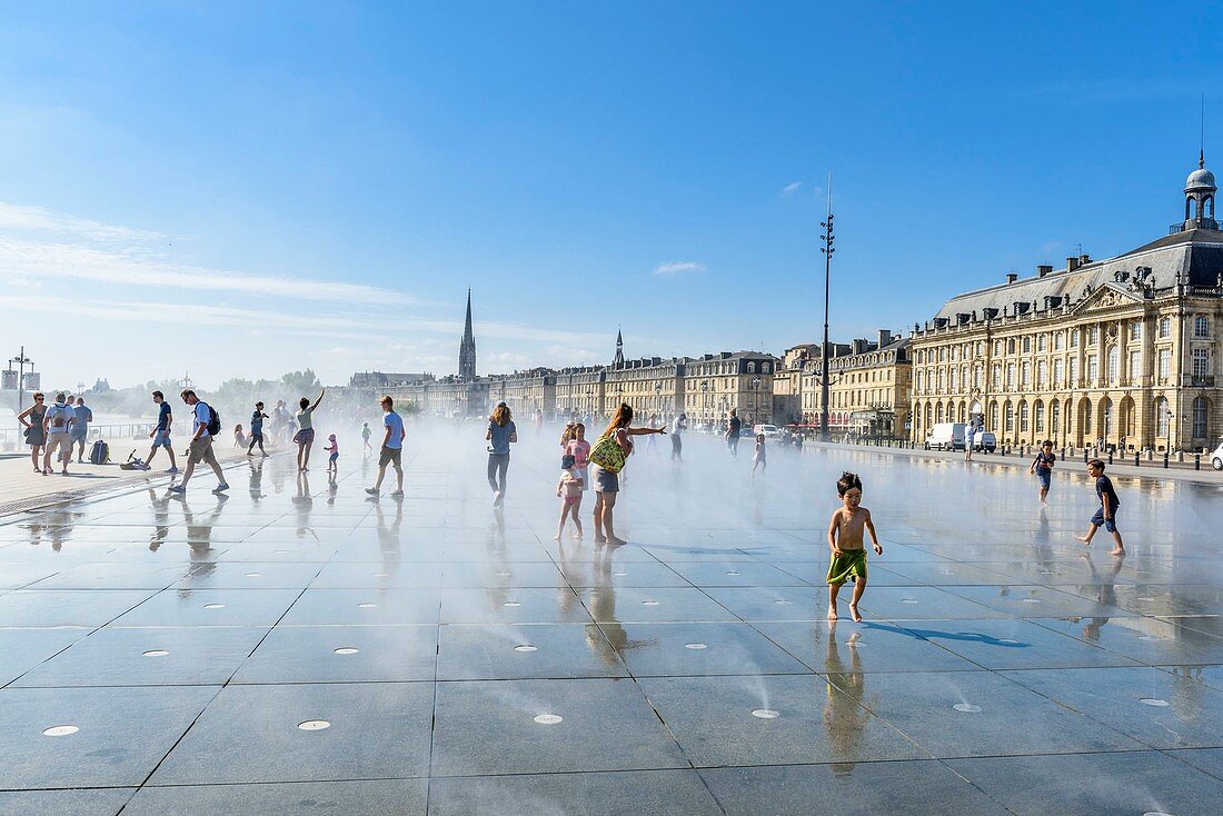 France, Gironde, Bordeaux, area listed as World Heritage by UNESCO, 18th century Bourse square, The Miroir d'eau (Water Mirror), 2006 work by the fountain maker Jean-Max Llorca, architect Pierre Gangnet and urbanist Michel Corajoud