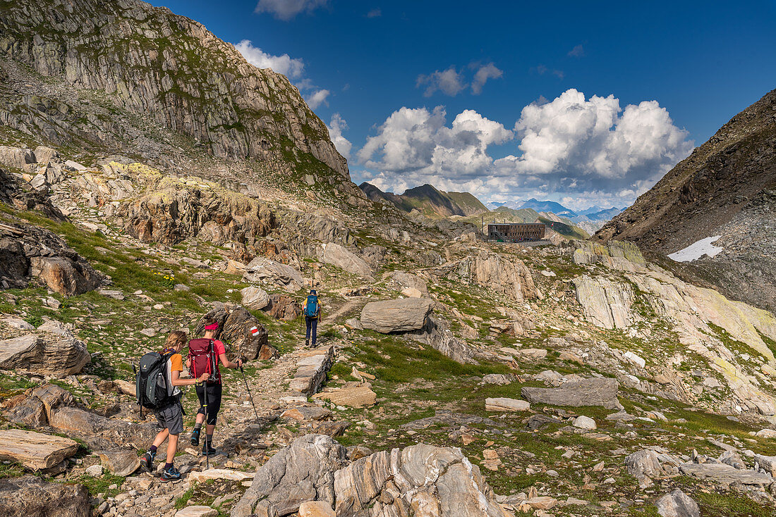 Hikers just before the Capanna Cristallina, 4th day stage, Trekking del Laghetti Alpini, Ticino, Switzerland