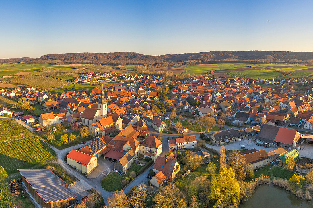 Aerial view of Wiesenbronn in the evening, Kitzingen, Lower Franconia, Franconia, Bavaria, Germany, Europe