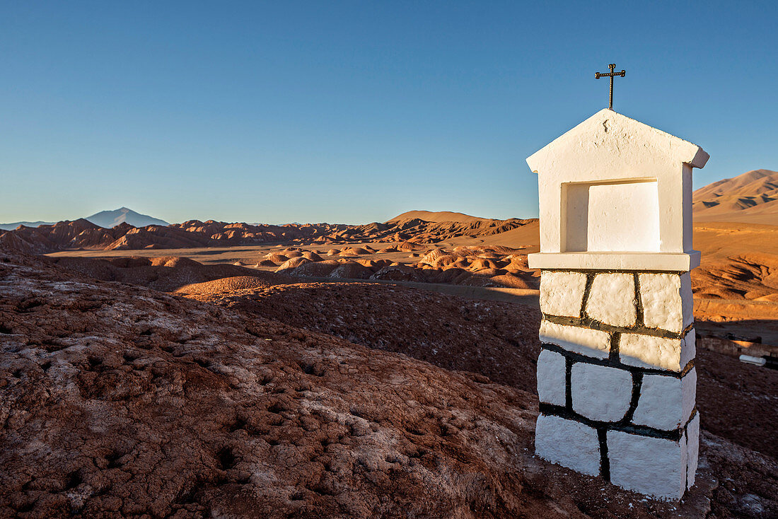 Tolar Grande, Salta province, Argentina, South America. A white chapel on a hill near the town