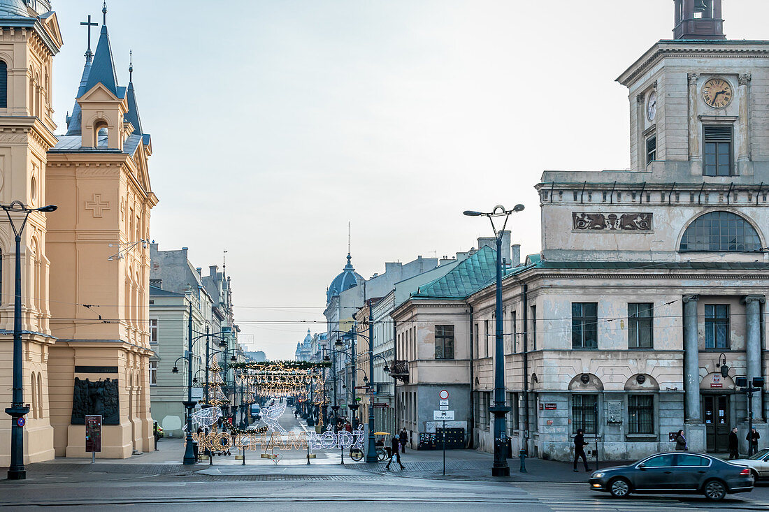 Plac Wolnosci and Ulica Piotrkowska, central shopping street in Lodz, Poland, Europe