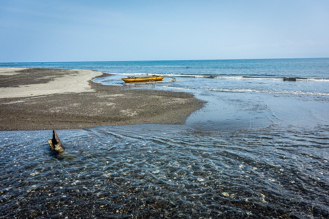 Traditional boat with outrigger on the beach in Malekula, Vanuatu, South Pacific, Oceania