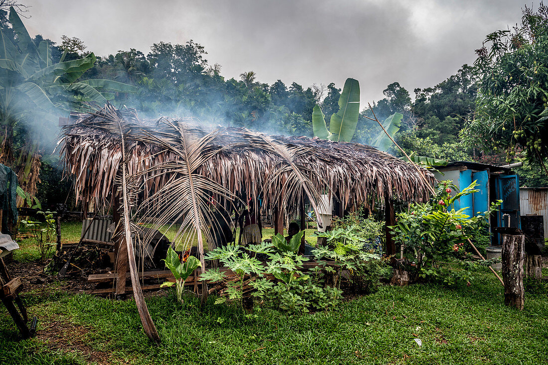 Cooking hut with smoke, Efate, Vanuatu, South Pacific, Oceania