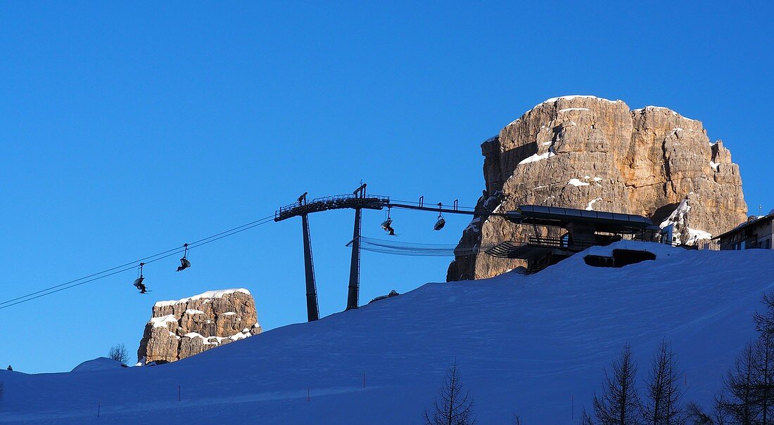 Hut in the ski area above Cortina d'Ampezzo, on the Cinque Torri, snow, Dolomites, ski lift, rocks, winter in Veneto, Italy