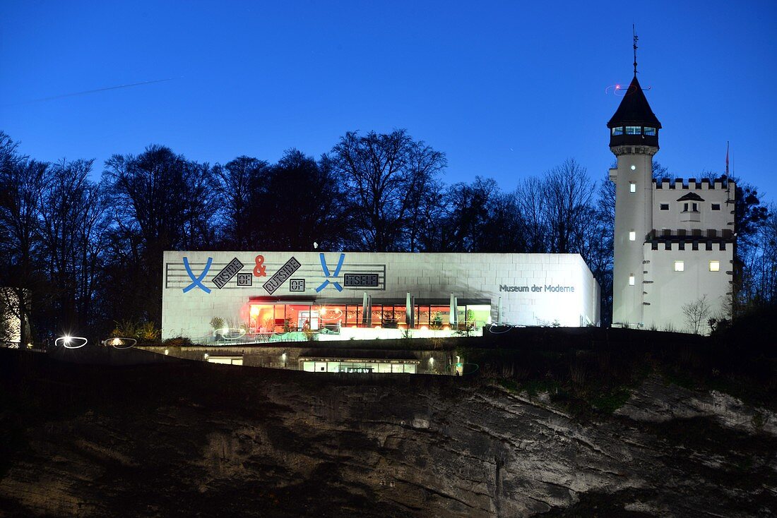 Museum der Moderne on Mönchsberg, evening light, blue sky, 2 buildings, tower, restaurant, Salzburg, Austria