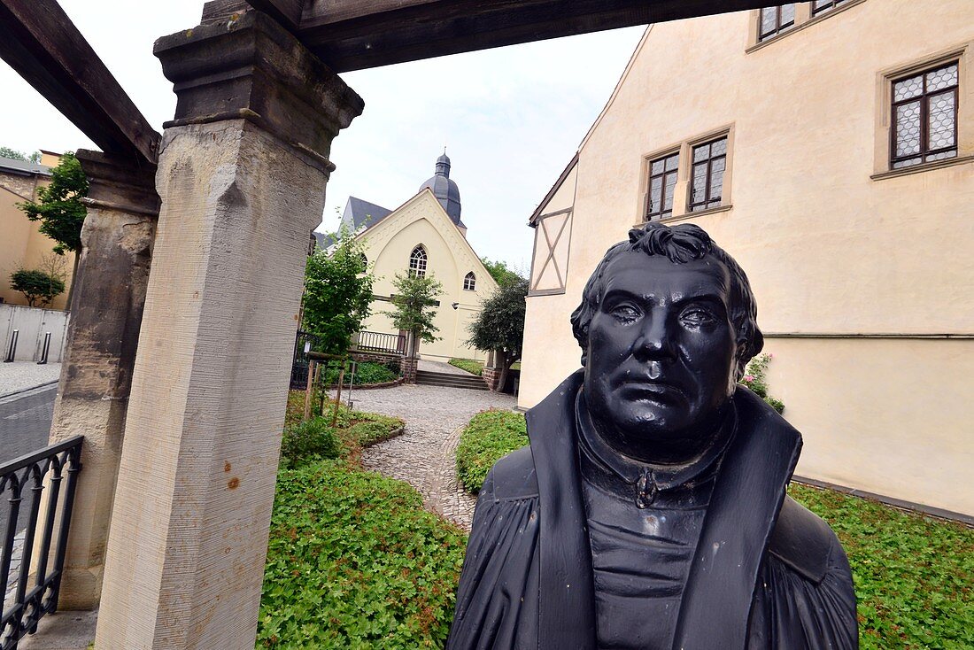 Luther house with museum with Luther bust in Lutherstadt Eisleben, Saxony-Anhalt, Germany