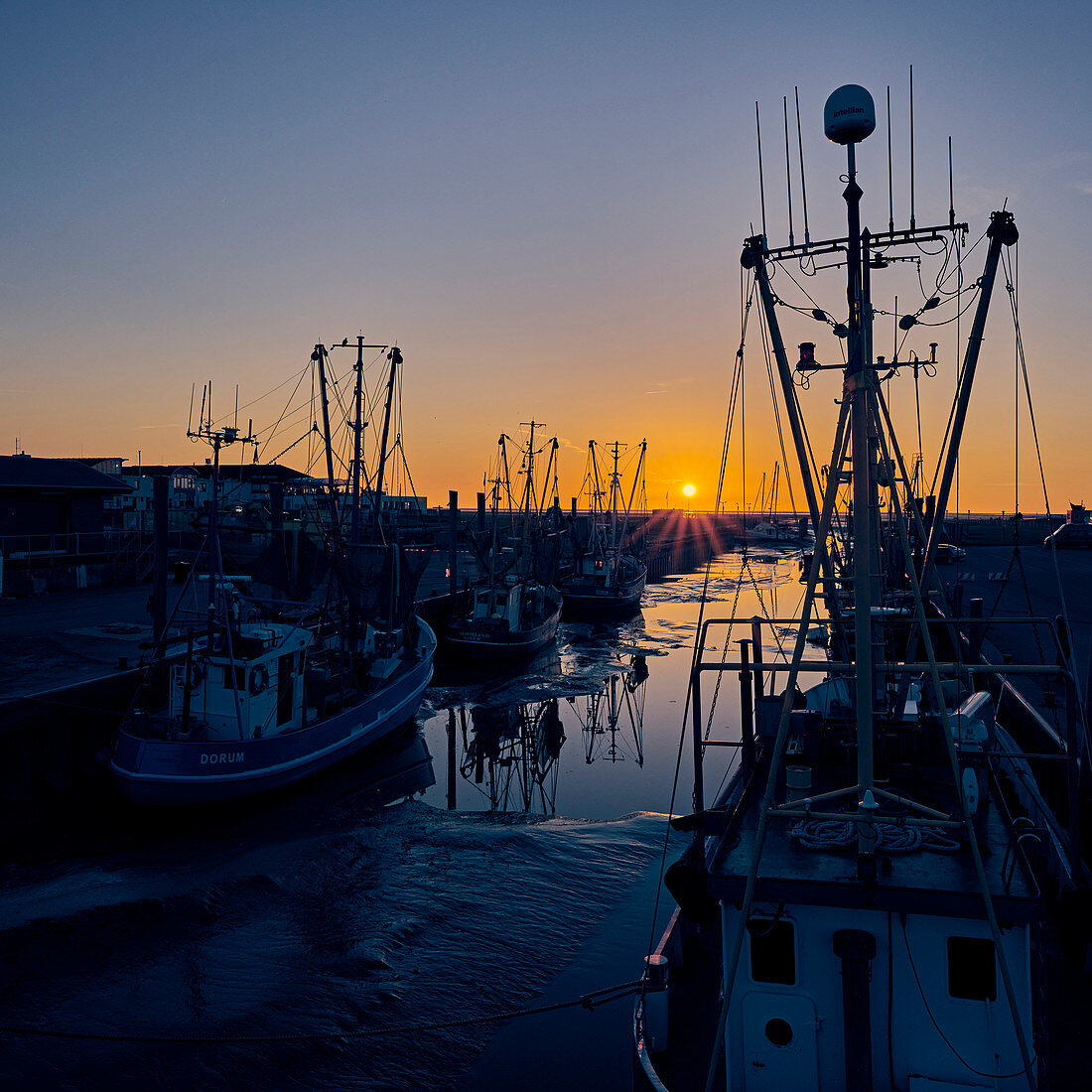 Sunset at the fishing port, Dorum, Lower Saxony, Germany