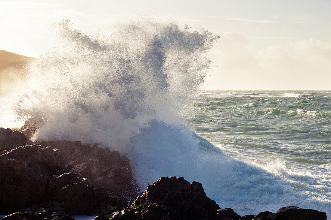 Waves at Goury Harbor on the northern tip of the Cotentin Peninsula, Normandy France.