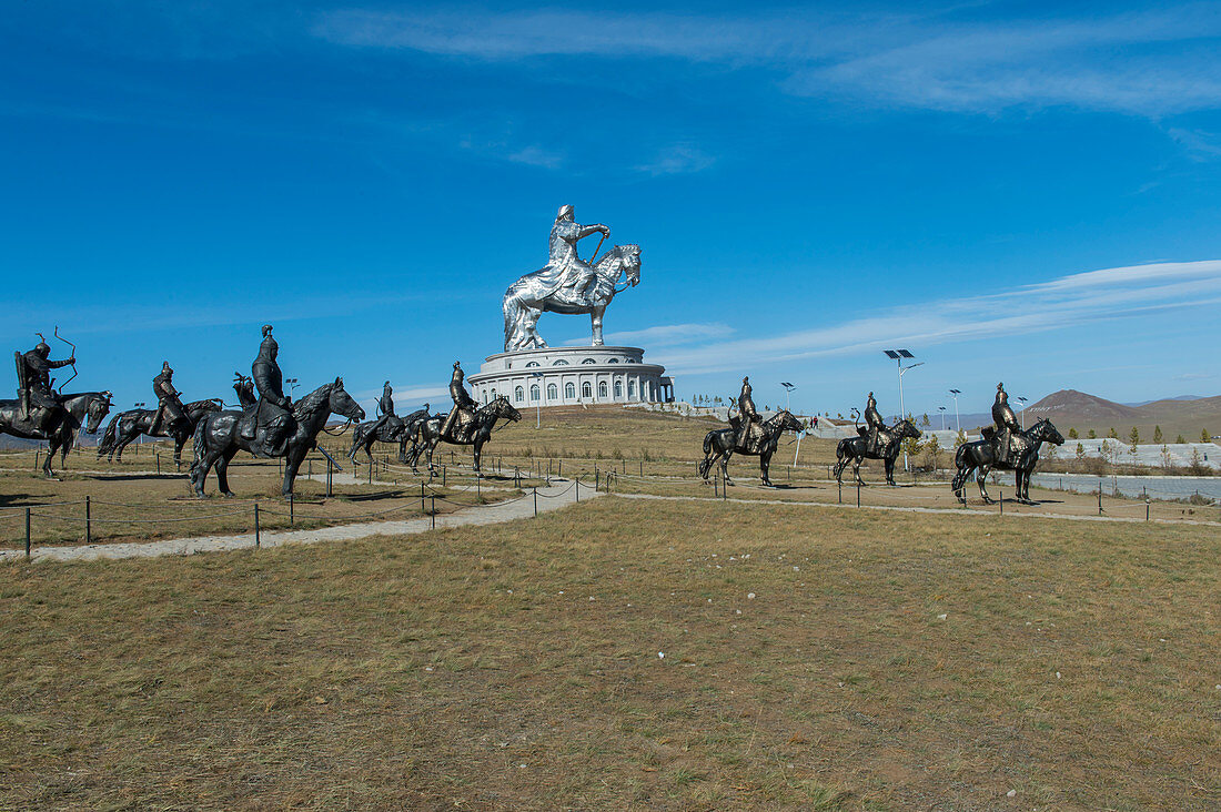 Bronze horsemen and the Genghis Khan Equestrian Statue (130 feet tall) are part of the Genghis Khan Statue Complex on the bank of the Tuul River at Tsonjin Boldog 33 miles east of Ulaanbaatar in Mongolia.