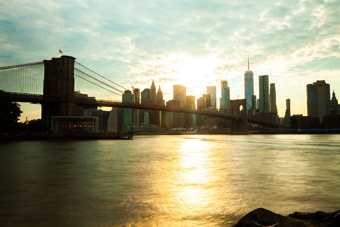 View of Brooklyn Bridge with skyline