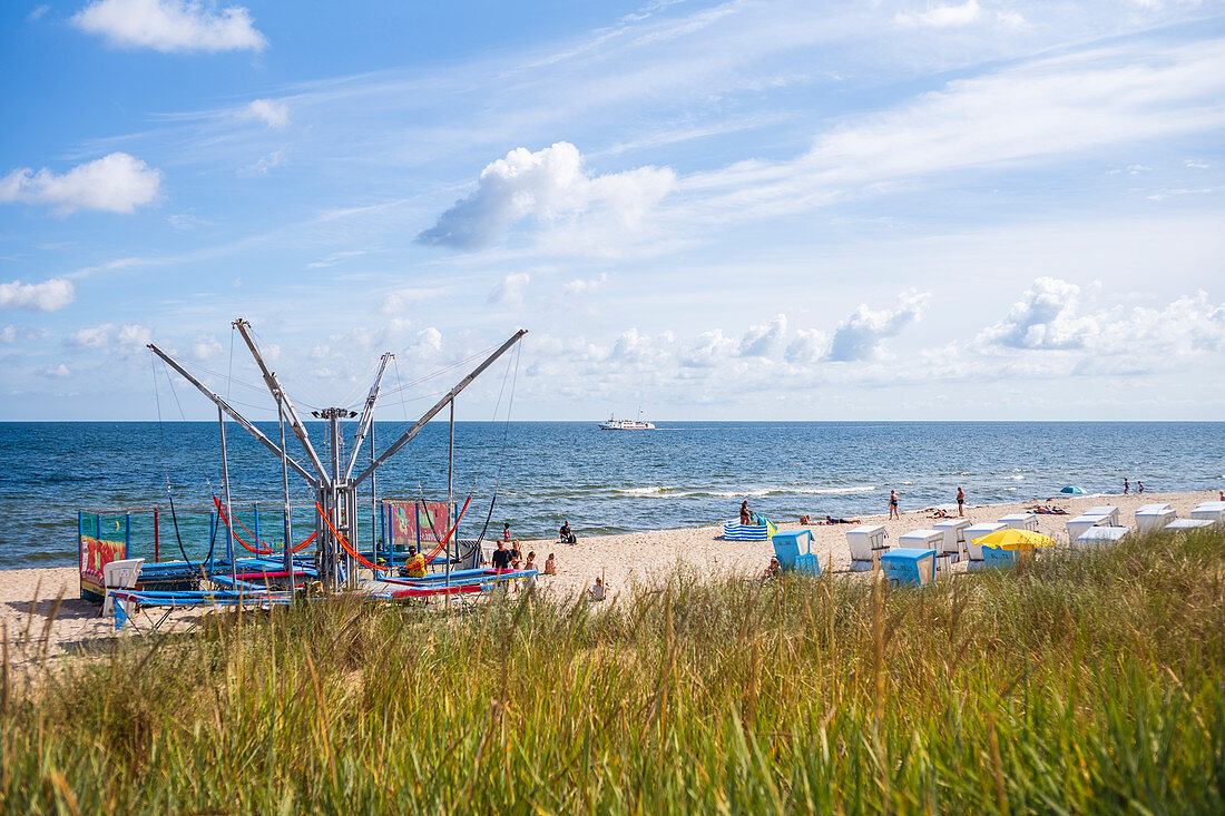 Attracktion for tourists on the beach of Zinnowitz in summer with beach chairs blue sky horizon, Usedom, Mecklenburg-Western Pomerania, Germany
