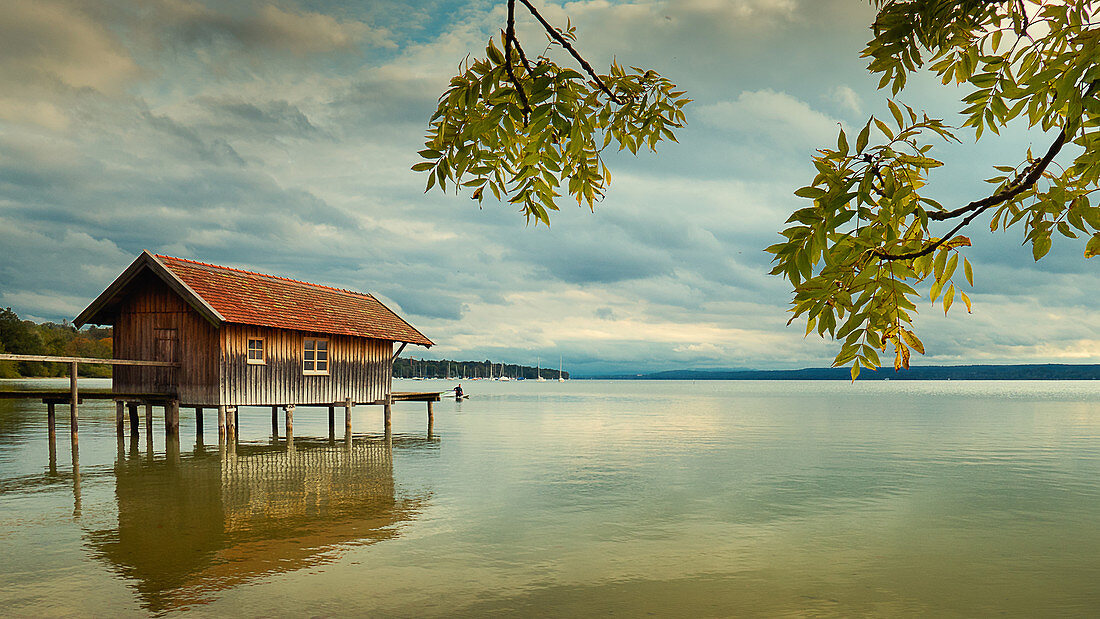 Boathouse at sunset on Ammersee, Bavaria, Germany