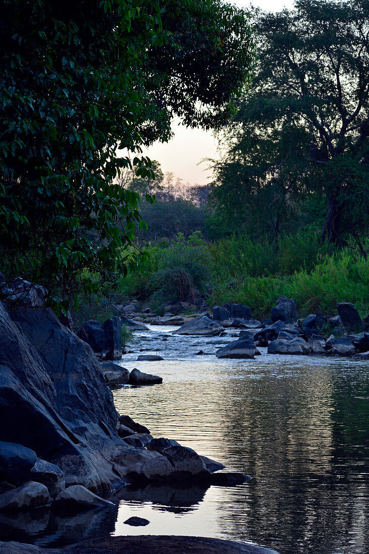 Malawi; Central Region; Bua River at dusk; near the Rafiki Safari Camp; on the edge of the Nkhotakota Wildlife Reserve