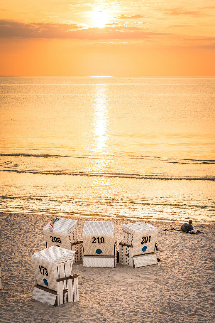 Beach chairs on the Rote Kliff in Kampen at sunset, Sylt, Schleswig-Holstein, Germany