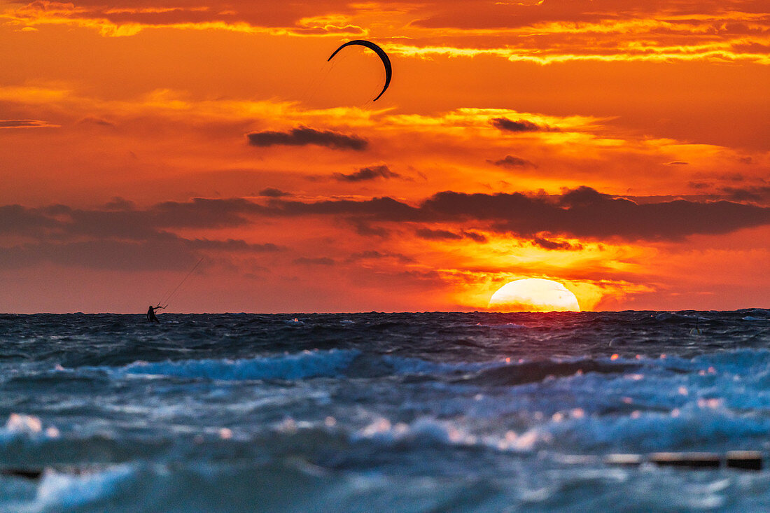 Kiting in front of the sunset, Baltic Sea, Heiligenhafen, Ostholstein, Schleswig-Holstein, Germany