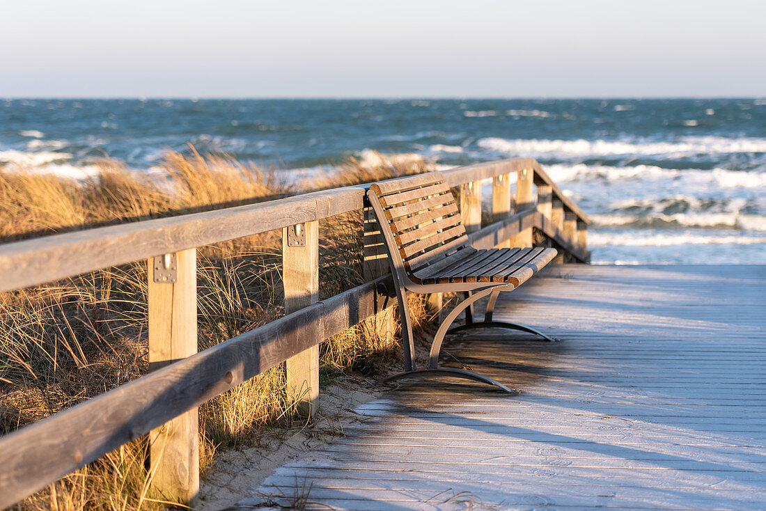 Bench at a beach crossing in Dahme, Baltic Sea, Schleswig-Holstein, Germany
