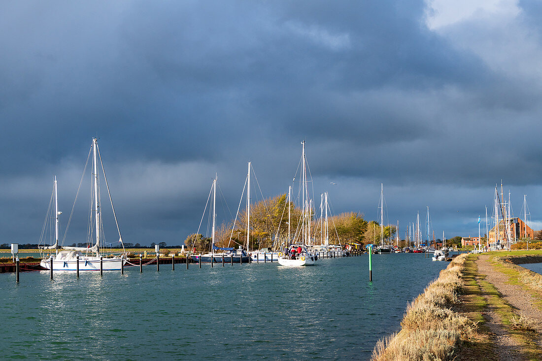 Harbor entrance with sailing boats in Ohrt on Fehmarn,
