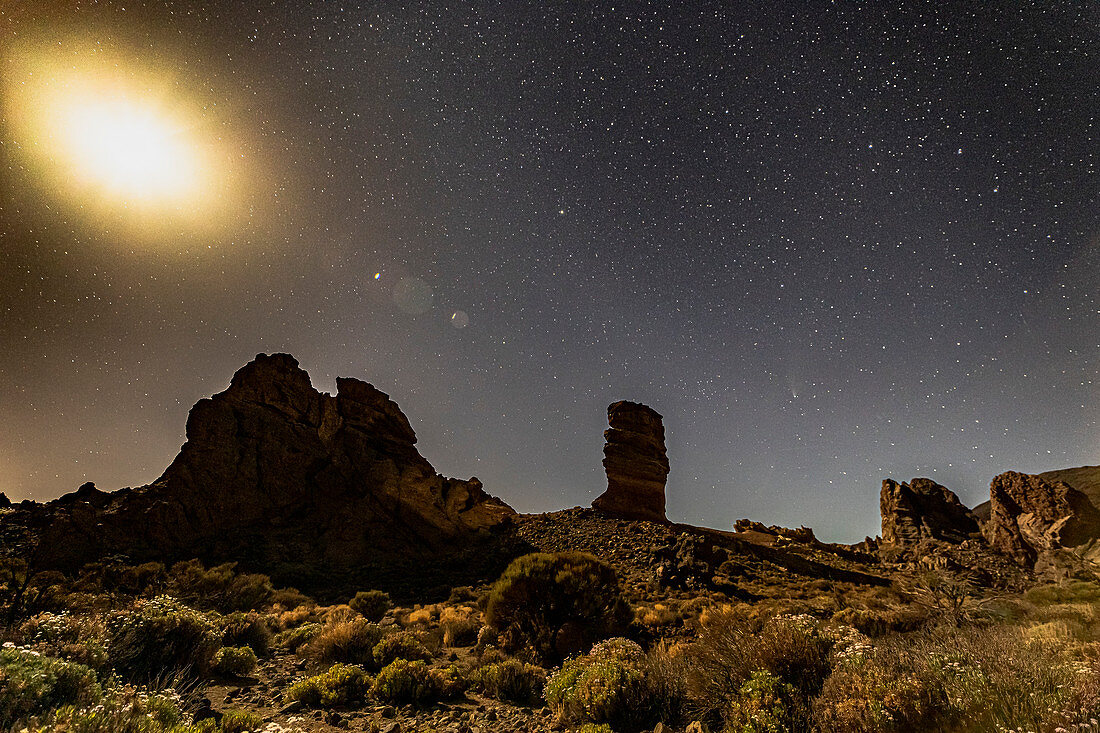 Night shot at the &quot;Roques de Garcia&quot; in Teide National Park with a view of volcanic peaks, Tenerife, Spain