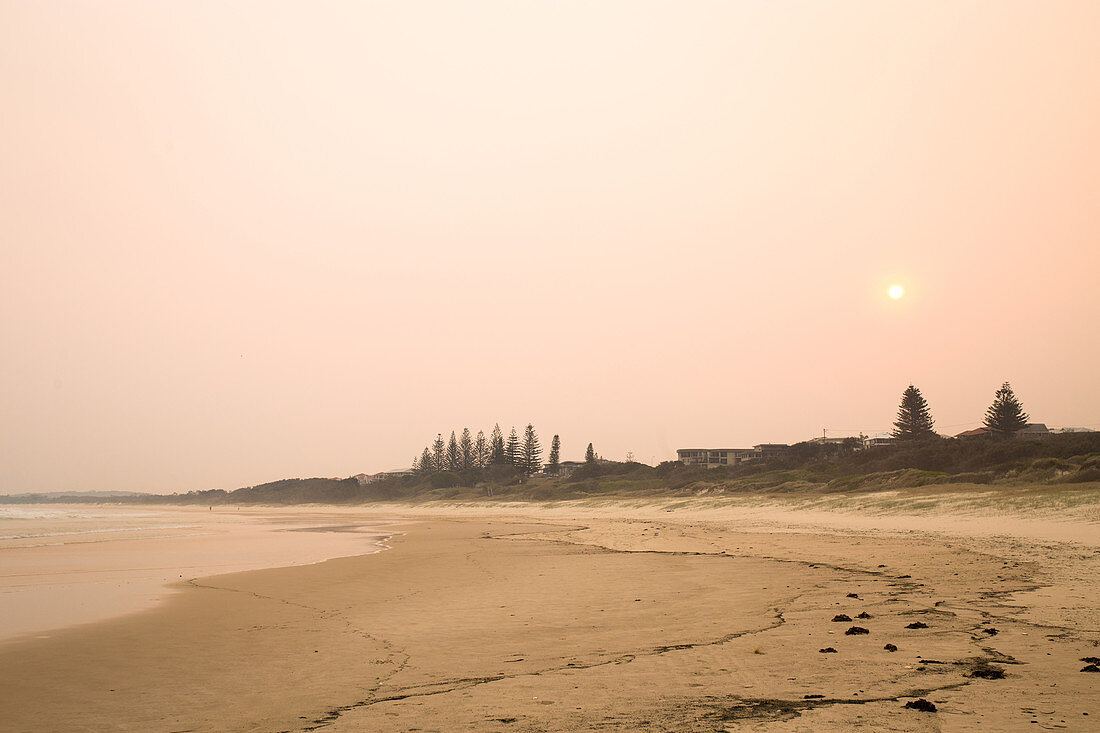 Bushfires color the sky red over Yamba in November 2019 in New South Wales, Australia.
