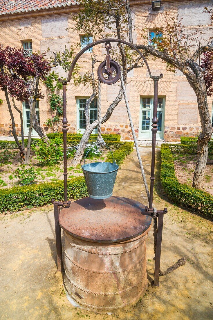 Well in a courtyard. Parador, Almagro, Ciudad Real province, Castilla La Mancha, Spain.