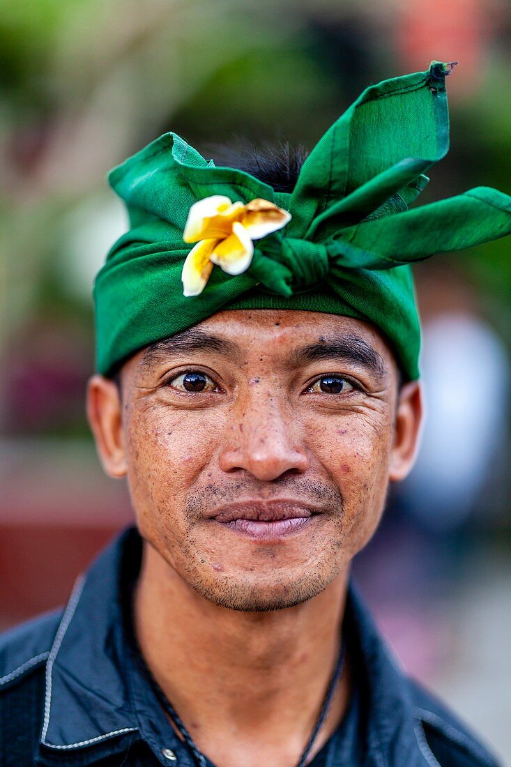 A Portrait Of A Balinese Hindu Man At The Batara Turun Kabeh Ceremony, Besakih Temple, Bali, Indonesia.