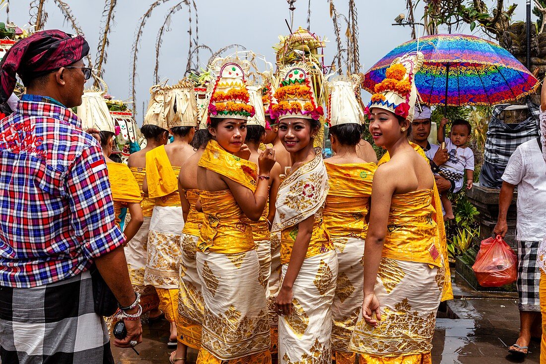 A Group Of Young Balinese Hindu Women At The Batara Turun Kabeh Ceremony, Besakih Temple, Bali, Indonesia.