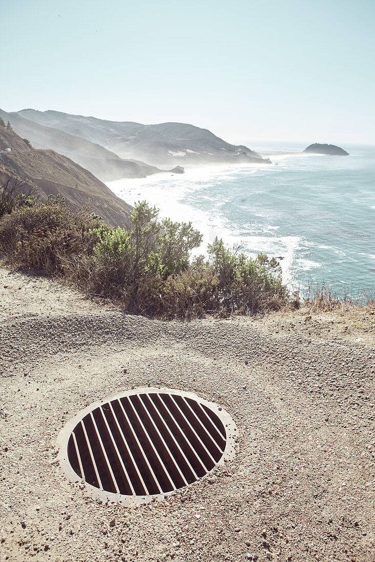 Drain grate on Highway 1 near Big Sur State Park, California, USA.