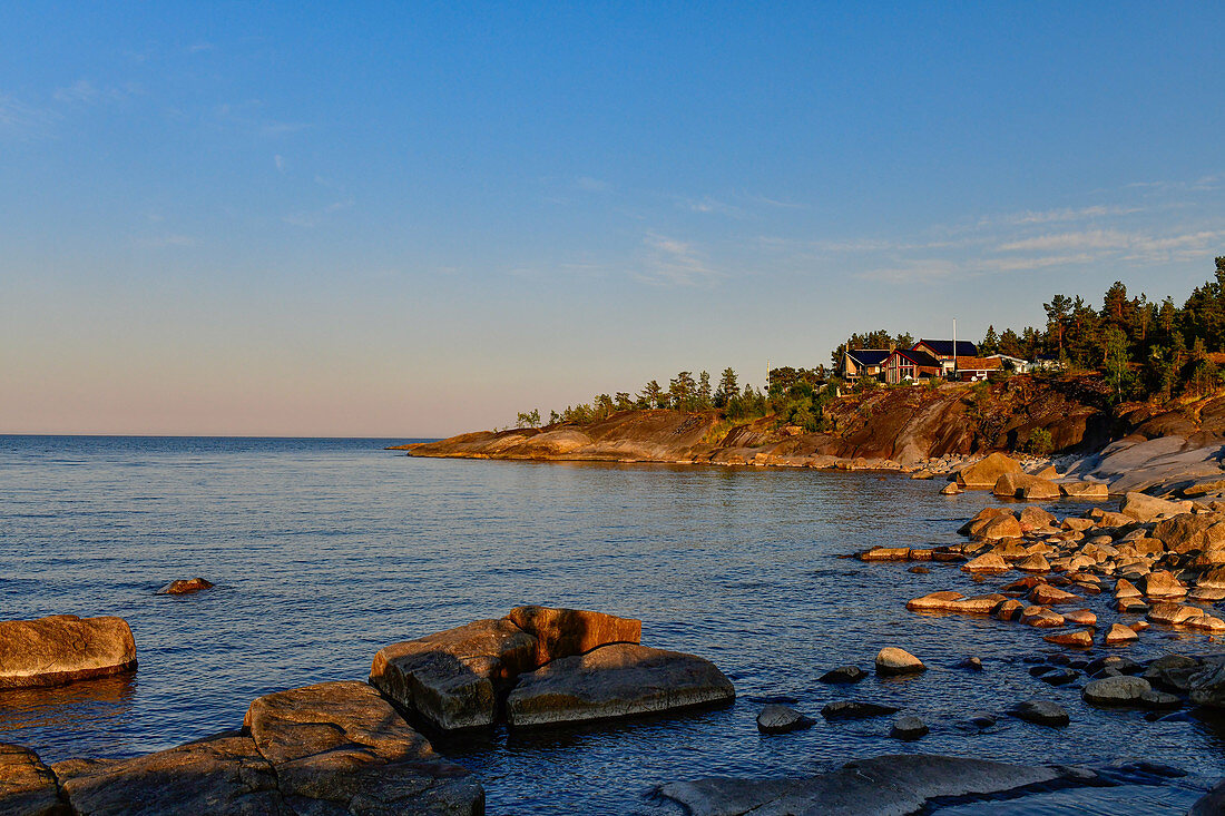 Weekend houses right on the rocky shore of the Baltic Sea, Klampenborg, Västernorrland, Sweden
