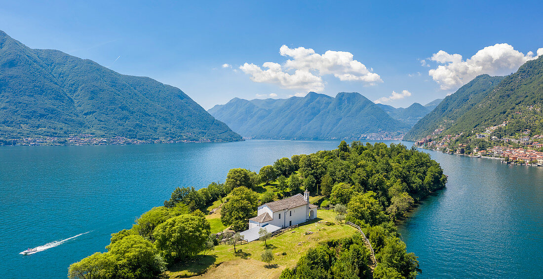 Aerial view of the Isola Comacina, Ossuccio, Tremezzina, Como Lake, Lombardy, Italy.