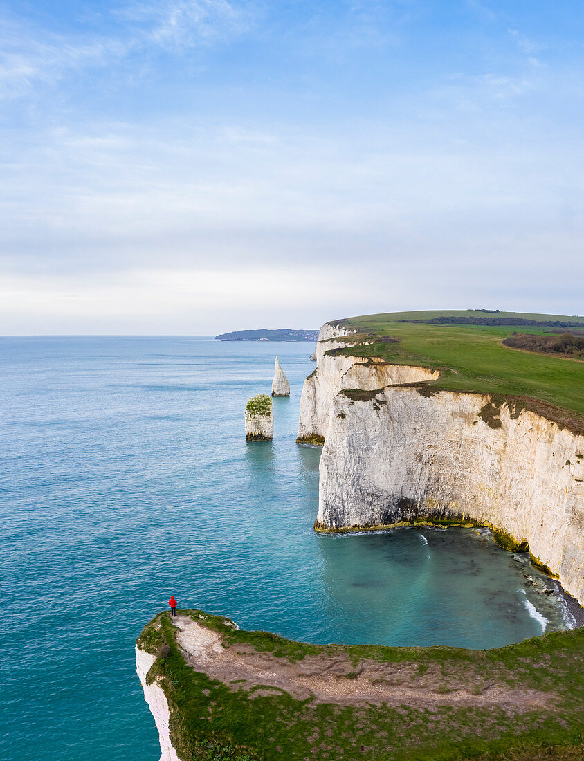 Aerial view at sunrise of the Old Harry Rocks, chalky formations near  Handfast Point, on the Isle of Purbeck in Dorset, Jurassic Coast, southern England. 