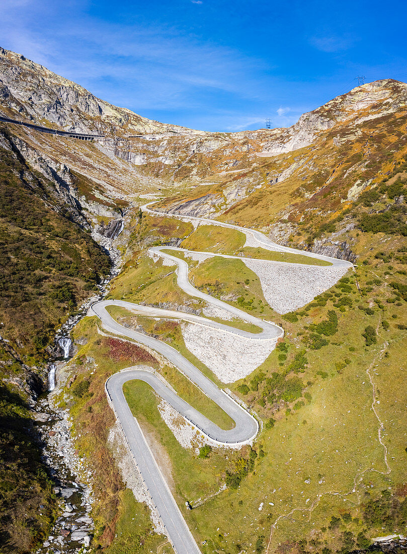 Aerial view of the Tremola San Gottardo road, the longest road monument in Switzerland listed in the inventory of the historic Swiss roads. Passo del San Gottardo, Airolo, Leventina district, Canton Ticino, Switzerland.