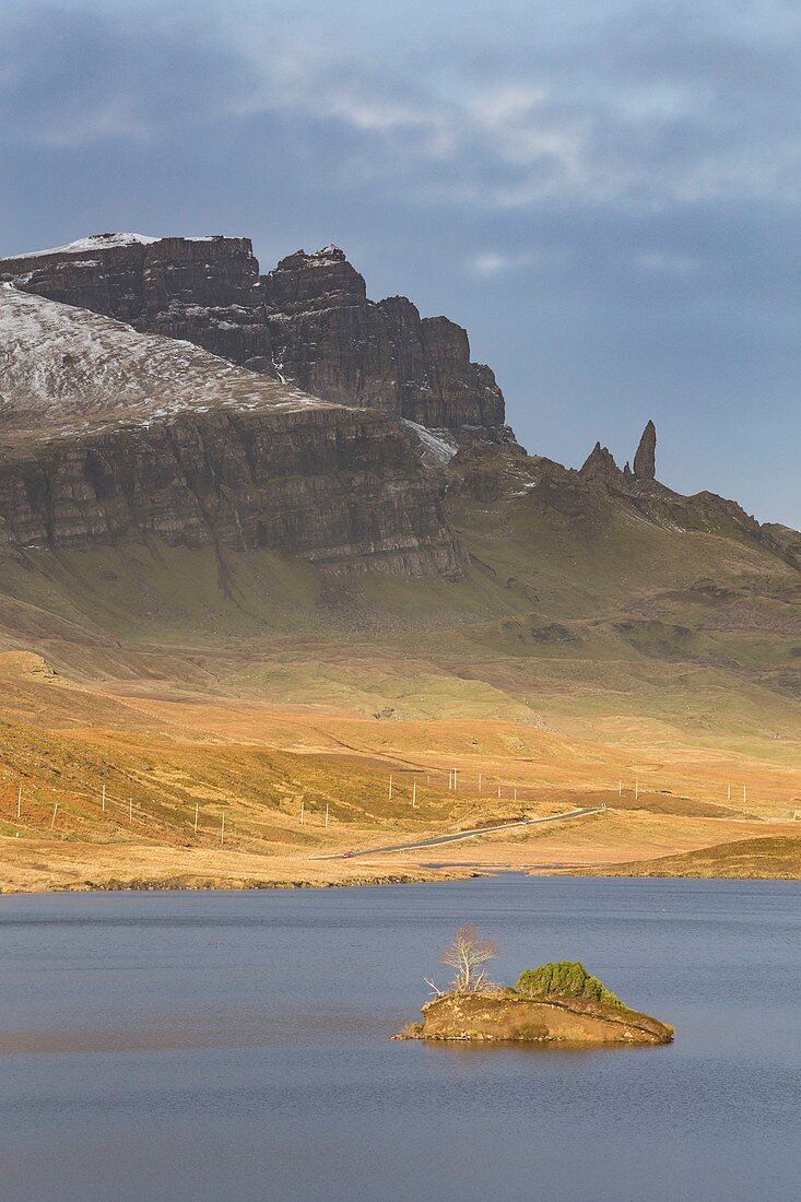 United Kingdom, Scotland, Highlands, Inner Hebrides, Isle of Sky, Trotternish, Loch Leathan and the rock formation Old Man of Storr in background