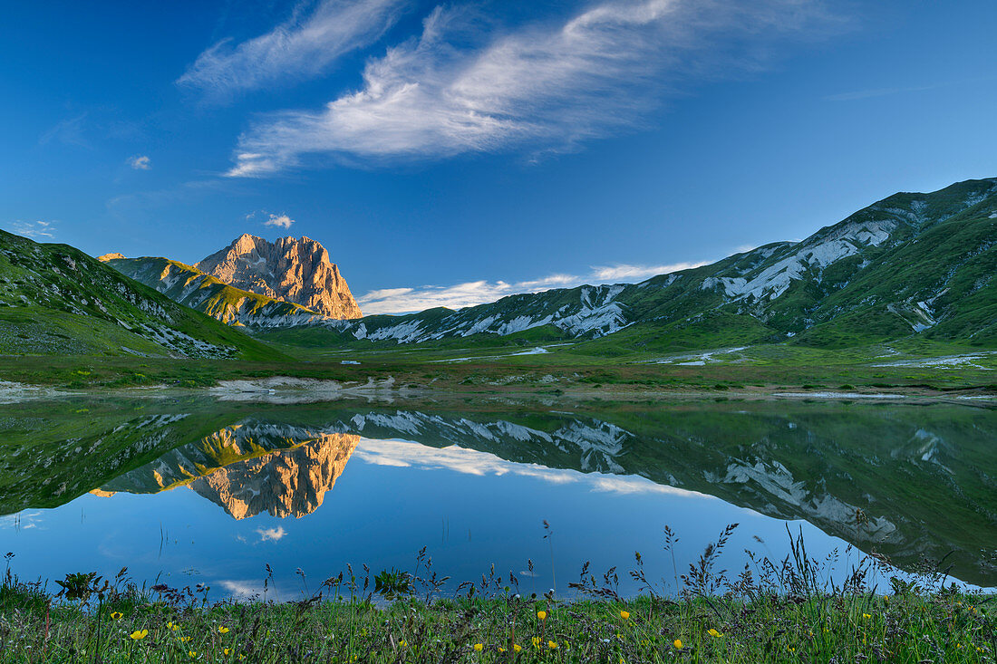 Gran Sasso reflected in mountain lake, Campo Imperatore, Gran Sasso, Gran Sasso National Park, Parco nazionale Gran Sasso, Apennines, Abruzzo, Italy