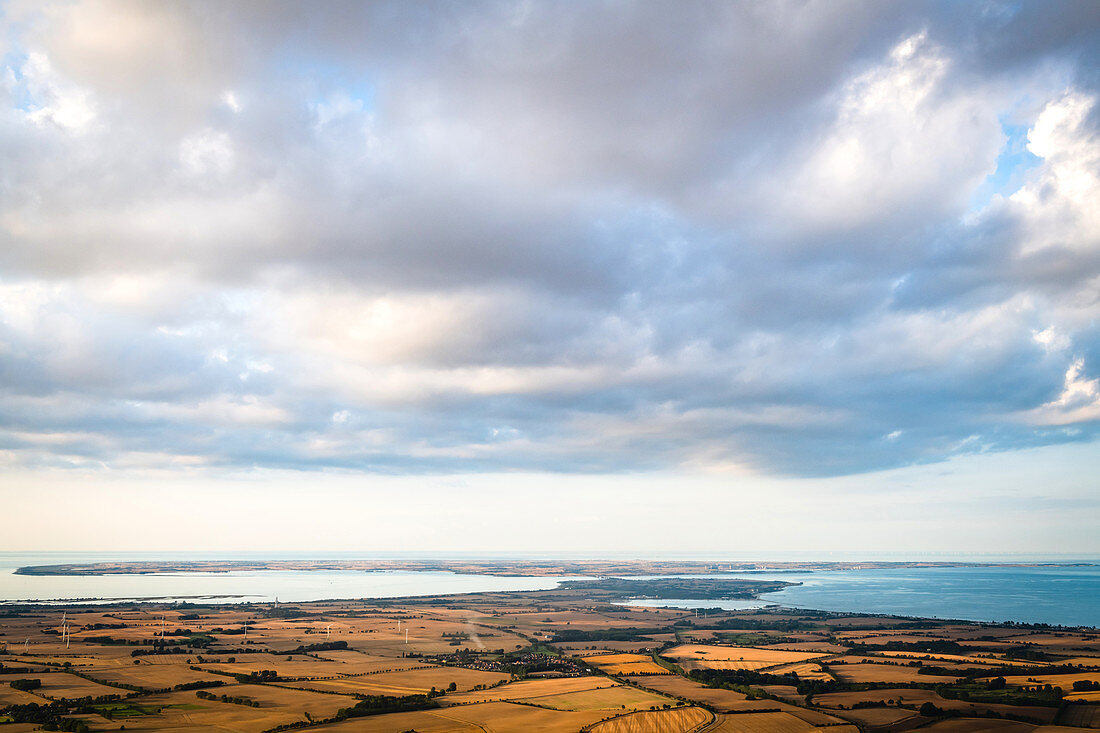 View from the balloon over harvested fields to the island of Fehmarn, Ostholstein, Schleswig-Holstein, Germany