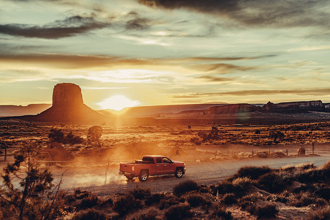 Pick-up truck at sunset in Monument Valley, Arizona, Utah, USA, North America