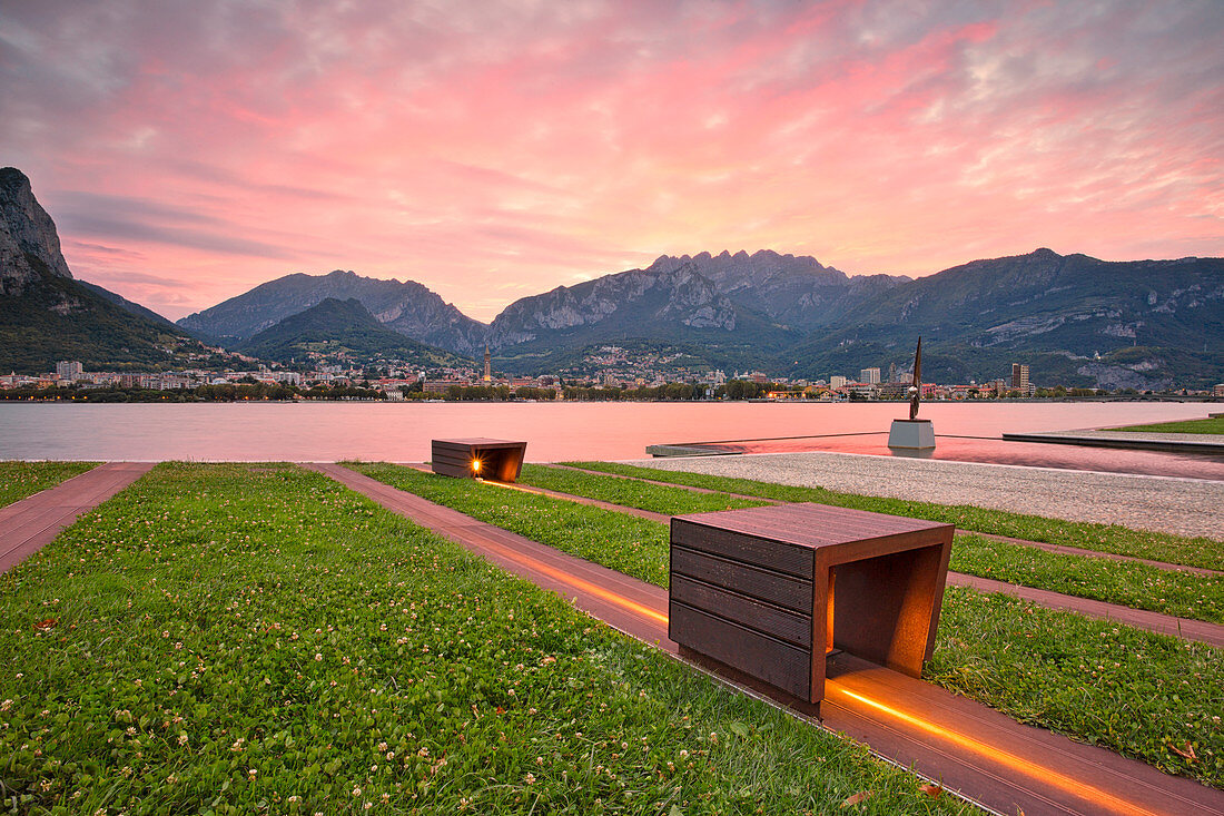 sunrise on the lakeside in front of Lecco,malgrate, lecco province, lombardy, north italy, italy
