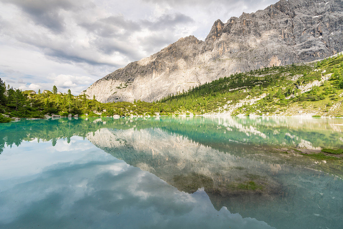 Reflection of the Sorapis group on Sorapis Lake in summer. . Cortina d'Ampezzo, Belluno province, Veneto, Italy.