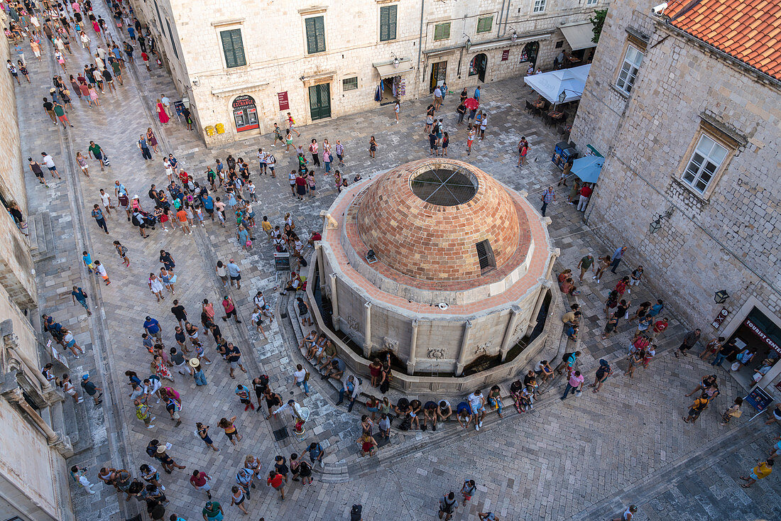 Tourists around the Jewish fountain, from an elevated point of view. Dubrovnik, Dubrovnik - Neretva county, Croatia.