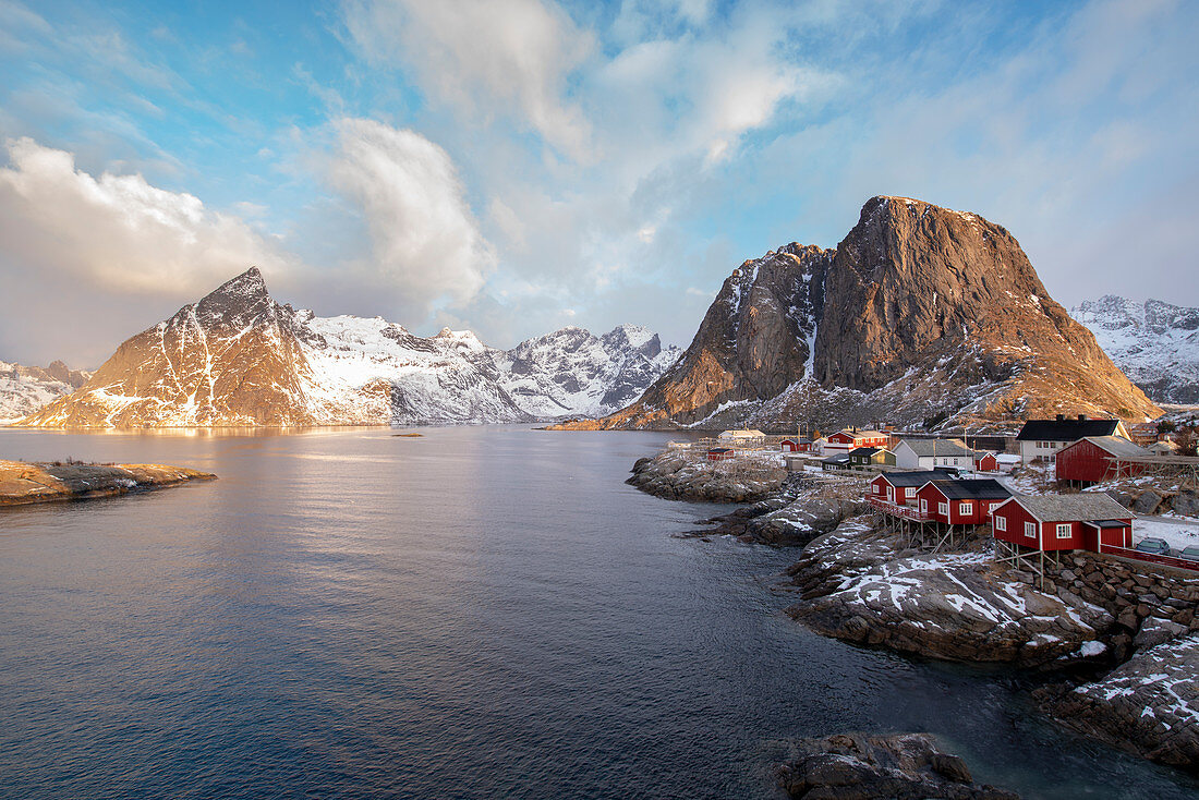 The fishing village with its traditional 'rorbus' in the winter morning light. Hamnoy, Nordland county, Northern Norway, Norway.