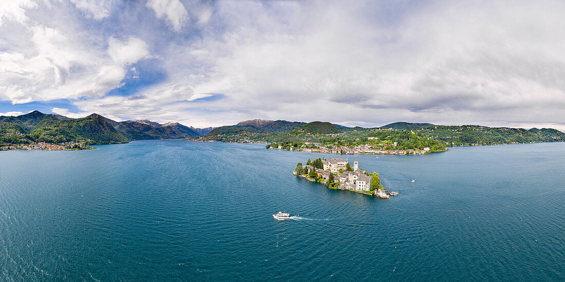 Panoramic aerial view of San Giulio Island and Orta San Giulio village at Lake Orta (Orta San Giulio, Lake Orta, Novara province, Piedmont, Italy, Europe)