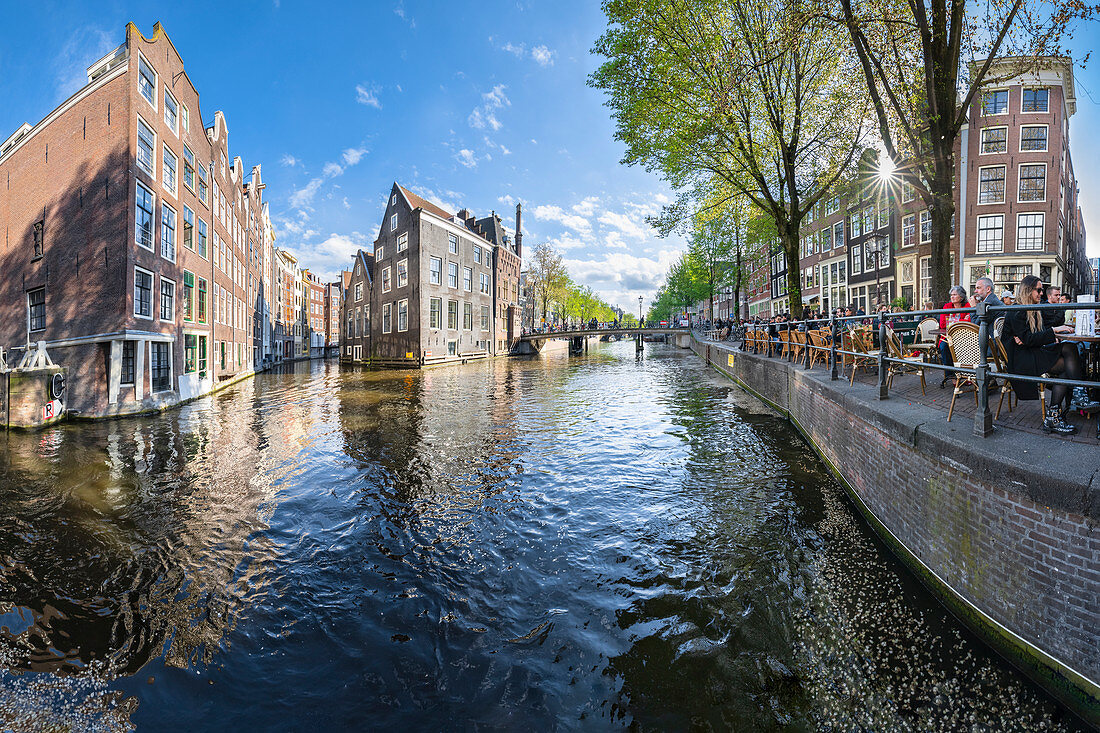 Oudezijds Voorburgwal canal in De Wallen district (Amsterdam, North Holland, Netherlands)
