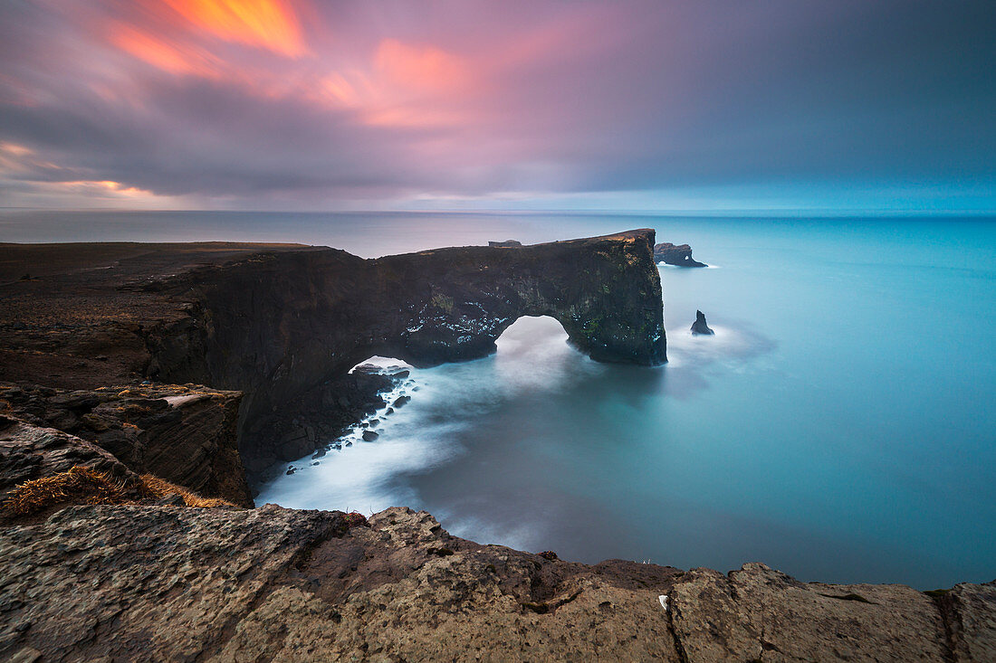 Dyrhólaey arch at sunrise, Vík í Mýrdal, southern Iceland, Iceland, Northern Europe