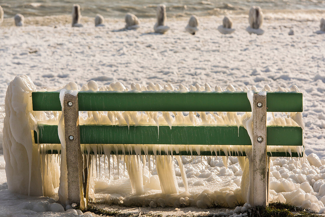 Bench by the Neuchatel lake under snow and ice. From Yverdon-les-Bains, Switzerland