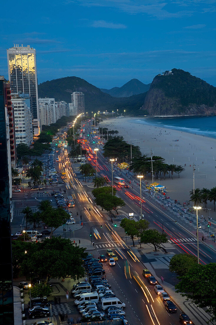 Copacabana Beach, and Avenue Atlantica at night, Copacabana, Rio de Janeiro, Brazil